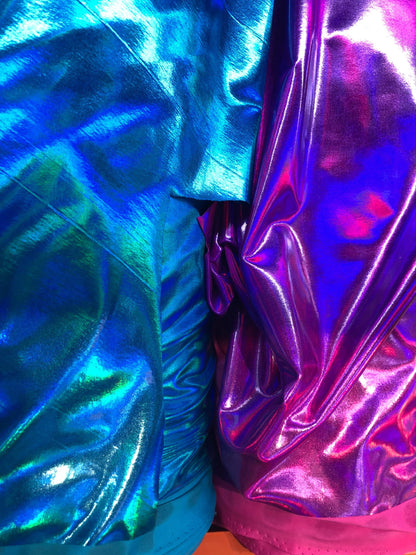 New iridescent all over foil turquoise and fuschia nylon spandex 4way stretch 58/60" Sold by the YD. Ships worldwide from Los Angeles CA USA