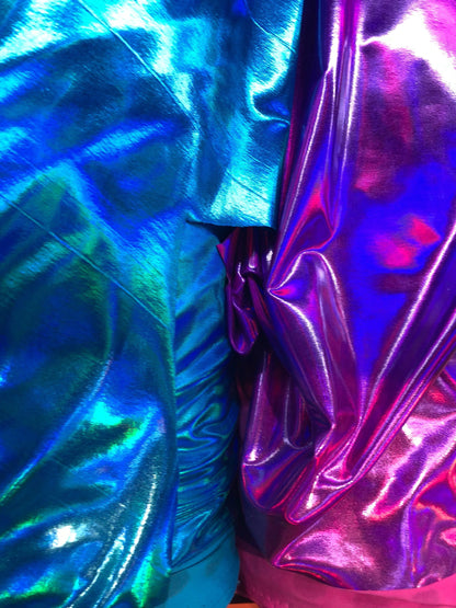 New iridescent all over foil turquoise and fuschia nylon spandex 4way stretch 58/60" Sold by the YD. Ships worldwide from Los Angeles CA USA