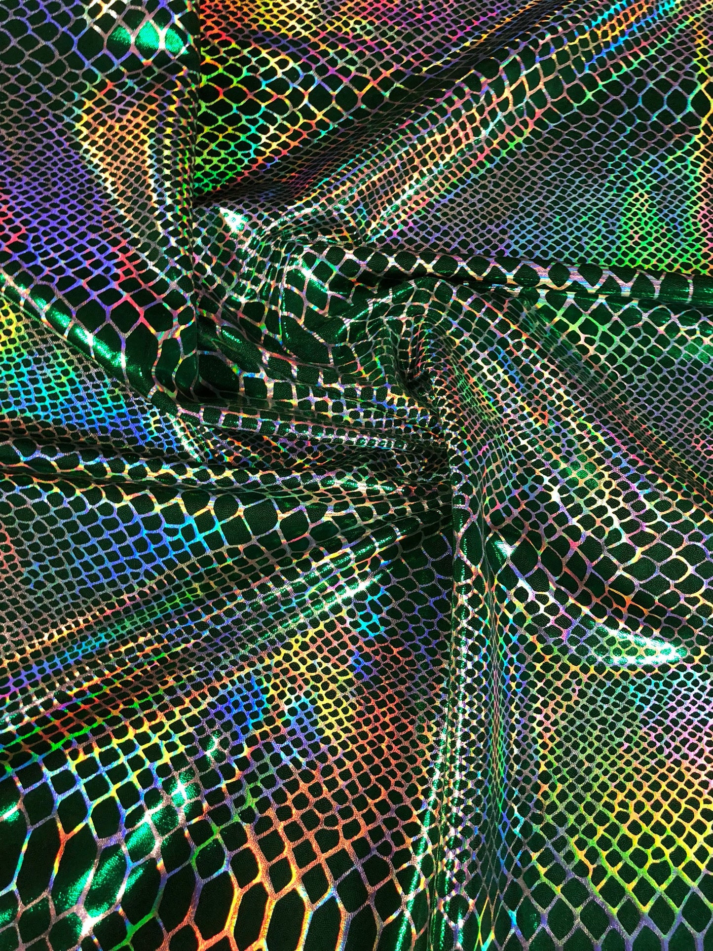 New iridescent Dragon design hologram two time foil print nylon spandex 4way Stretch 58/60" Sold by the YD. Ships worldwide from L.A CA USA