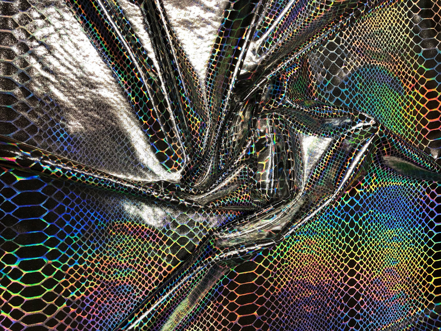 New iridescent Dragon design hologram two time foil print nylon spandex 4way Stretch 58/60" Sold by the YD. Ships worldwide from L.A CA USA