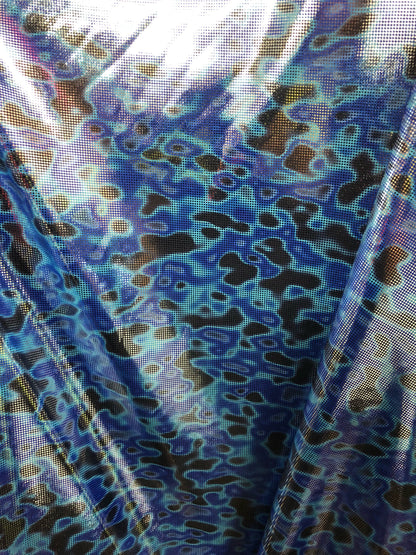 New Lava design with silver foil dots in nylon spandex 4way stretch 58/60" Sold by the YD. Ships worldwide from Los Angeles CA USA