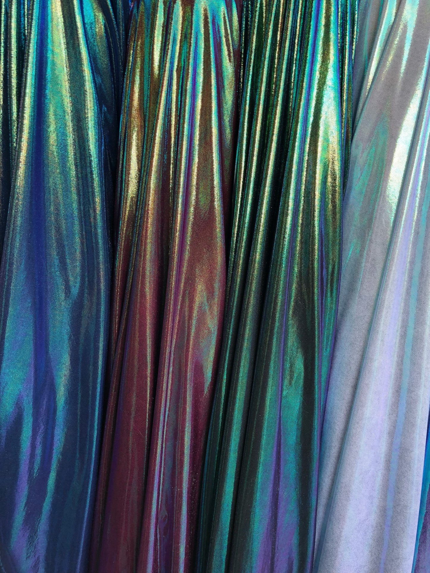 New iridescent foggy foil on nylon spandex 4way stretch 58/60" Sold by the YD. Ships worldwide from Los Angeles California USA