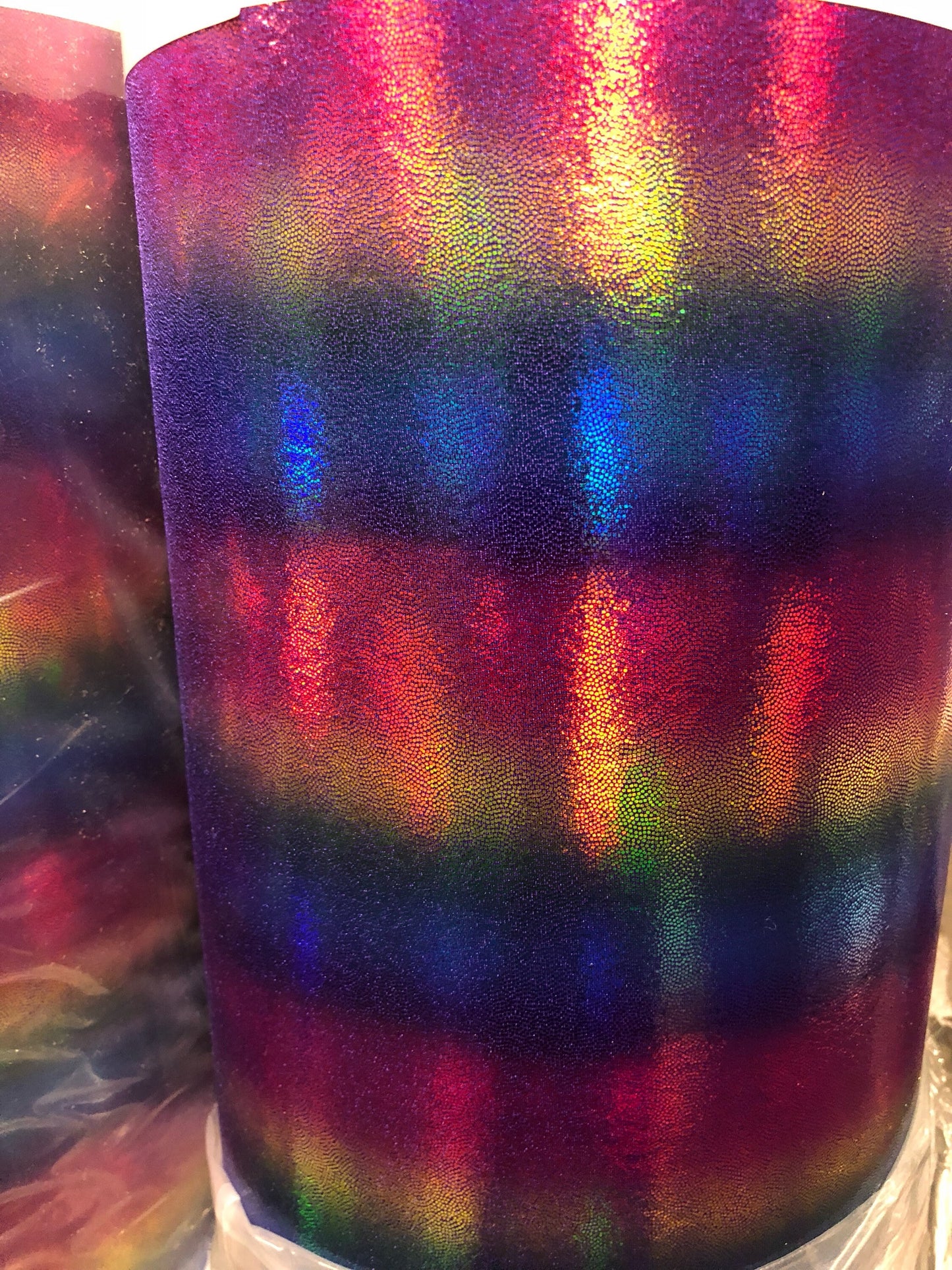 New rainbow design all over foil metallic nylon spandex 4way 58/60" Sold by the YD. Ships worldwide from Los Angeles California USA