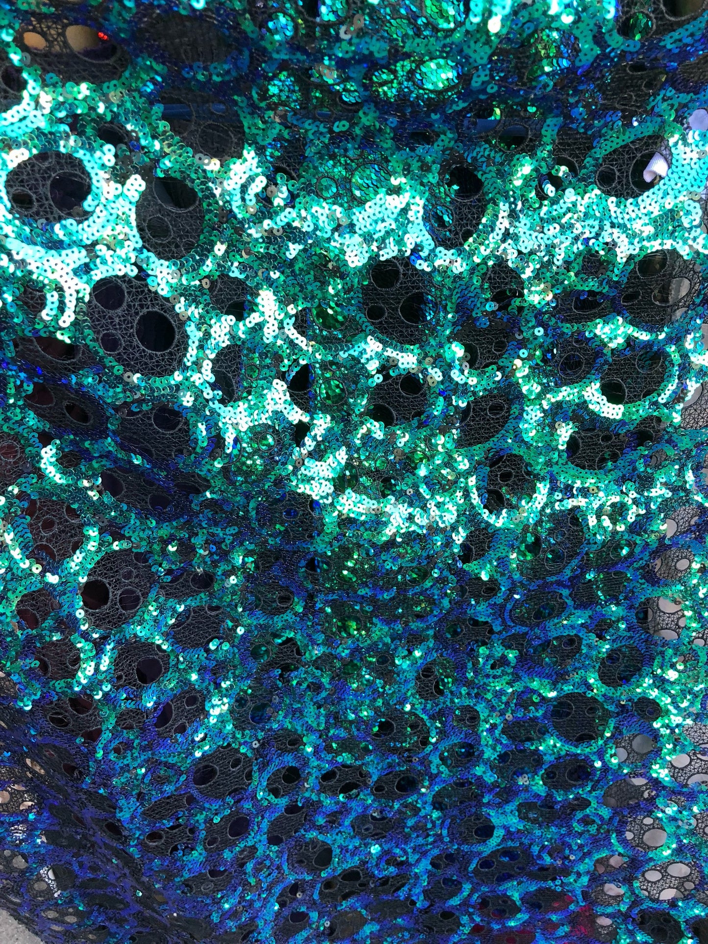 New lace with sequins oval design iridescent peacock color non Stretch 50/52" Sold by ghe YD. Ships worldwide from Los Ángeles CA USA