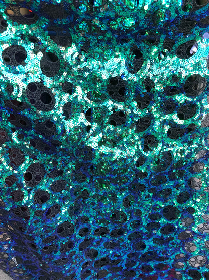 New lace with sequins oval design iridescent peacock color non Stretch 50/52" Sold by ghe YD. Ships worldwide from Los Ángeles CA USA