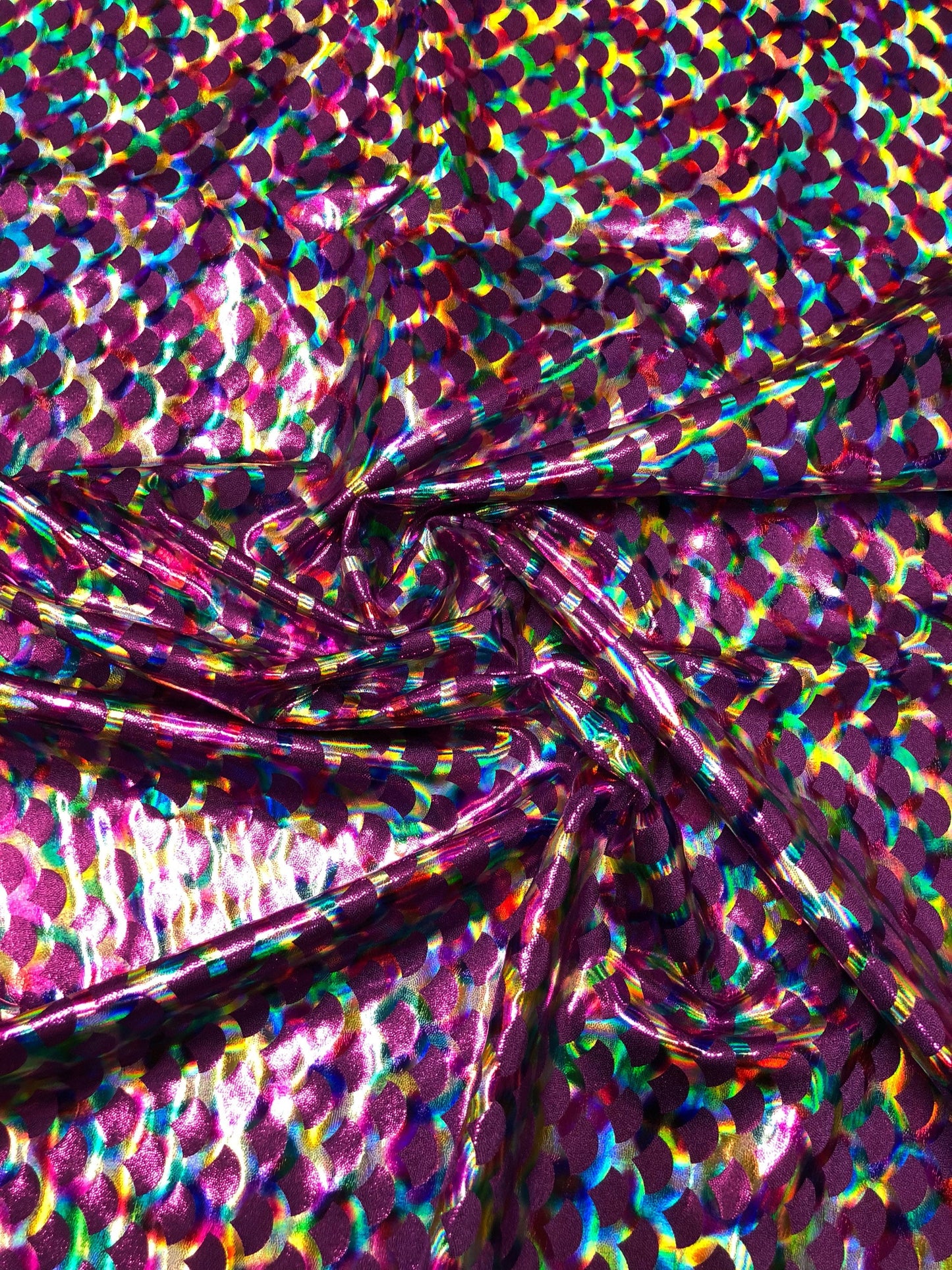 New mermaid design doble hologram foil on nylon spandex 4way Stretch 58/60" Sold by the YD. Ships worldwide from Los Angeles California USA.