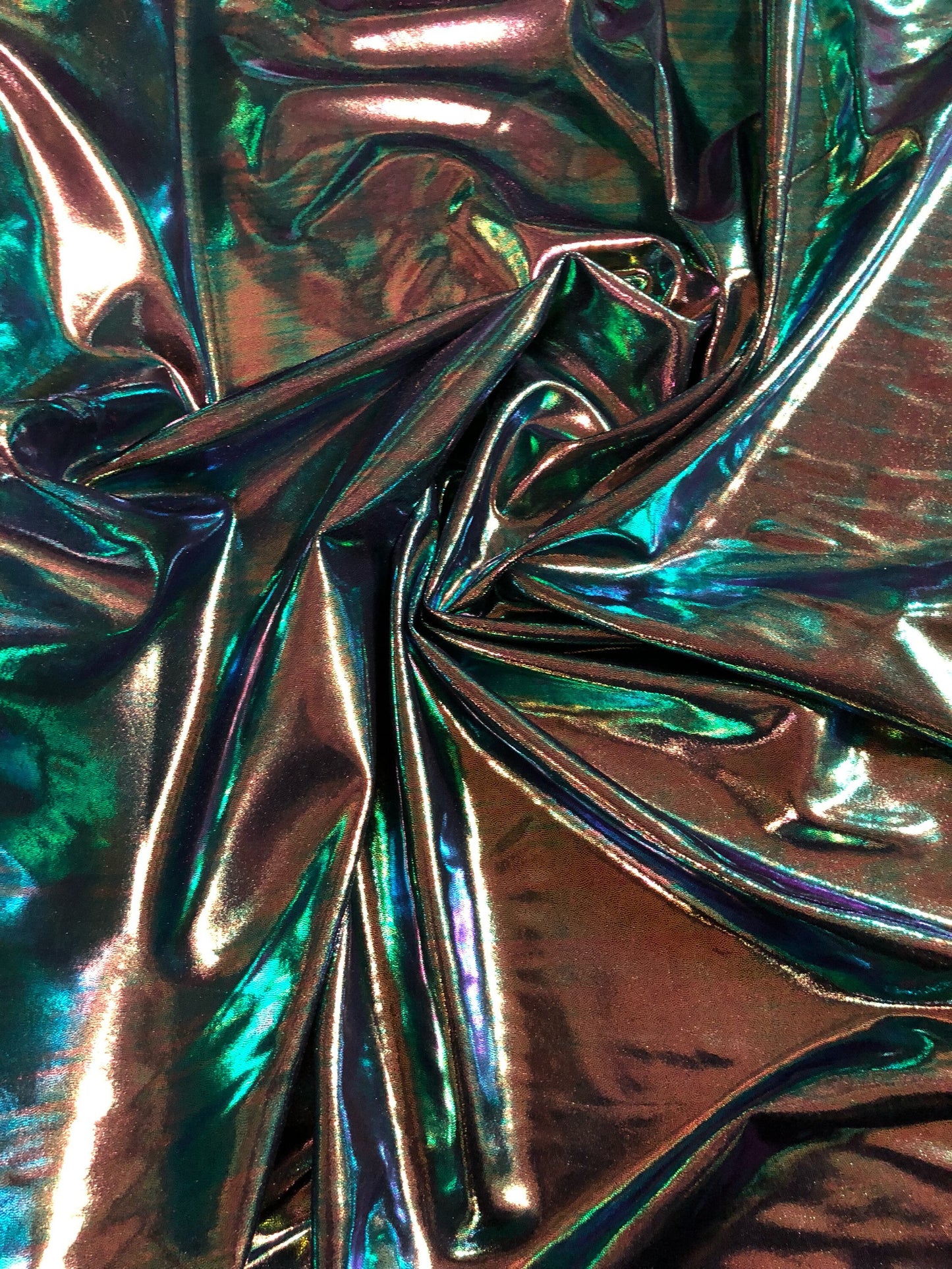 New Iridescent foggy foil oil effect metallic nylon spandex 4way stretch Sold by the YD. Ships worldwide from Los Angeles California USA