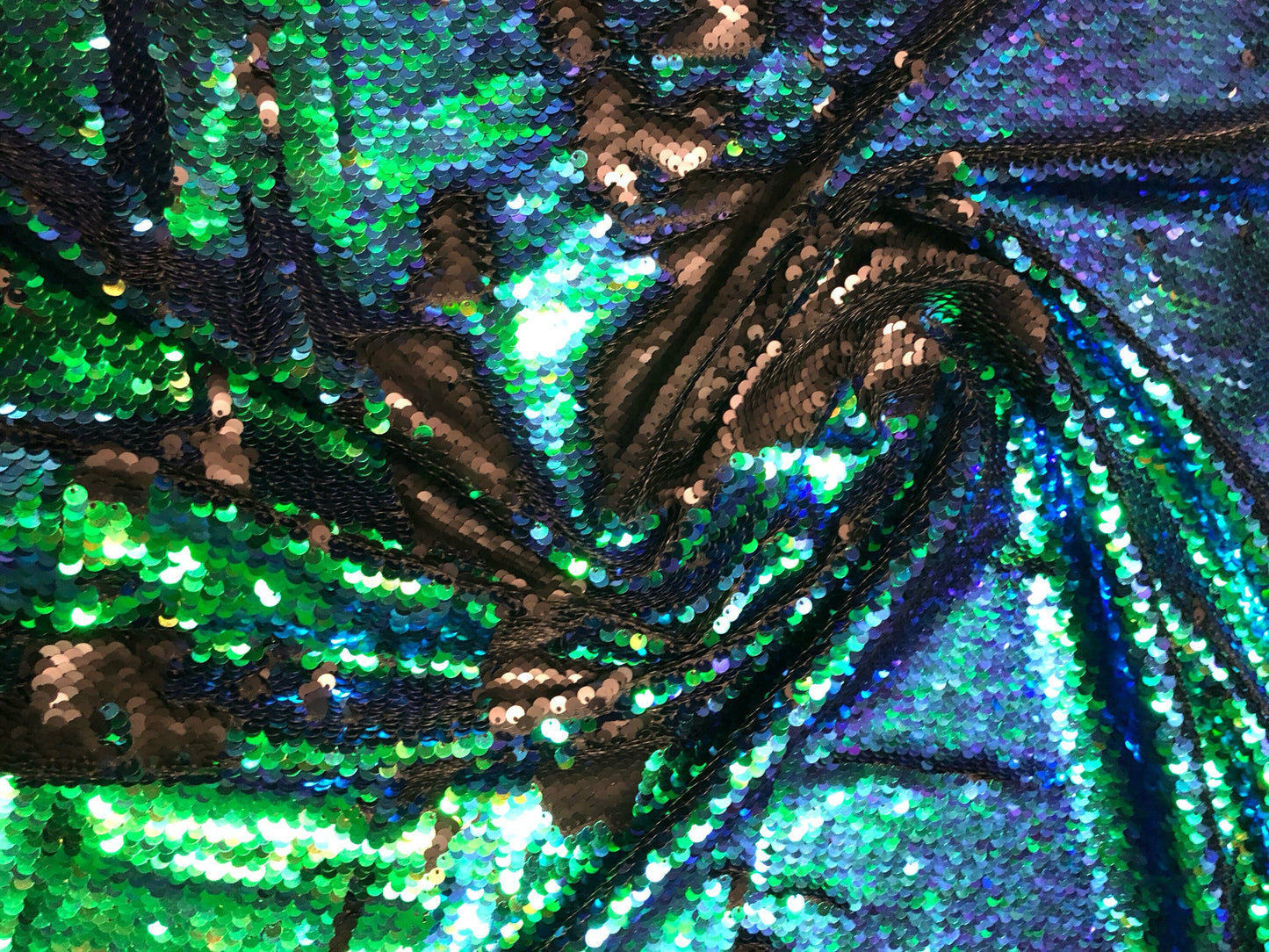 New flip up sequins reversible sequins green/black spandex base 2way strech 58/60" Sold by the YD. Ships worldwide from Los Angeles CA USA