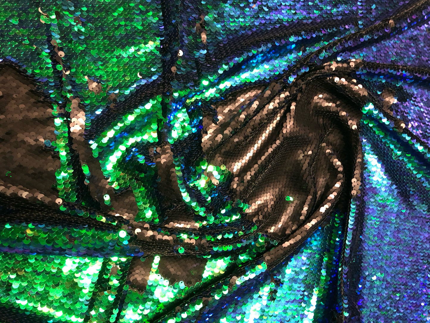 New flip up sequins reversible sequins green/black spandex base 2way strech 58/60" Sold by the YD. Ships worldwide from Los Angeles CA USA