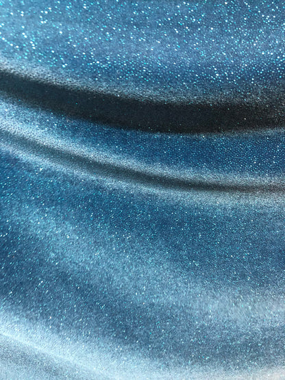 Stretch velvet with glitter teal color heavy velvet 4way Stretch 58/60" Sold by the YD. Ships worldwide from Los Angeles California USA.