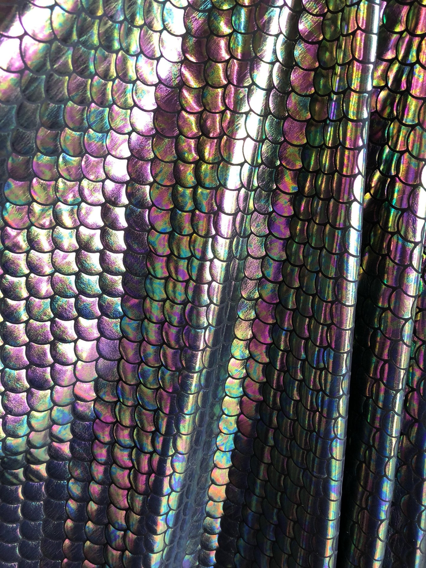 New iridescent pewter mermaid design on nylon spandex 4way Stretch 58/60" Sold bu the YD. ships worldwide from Los Angeles California USA