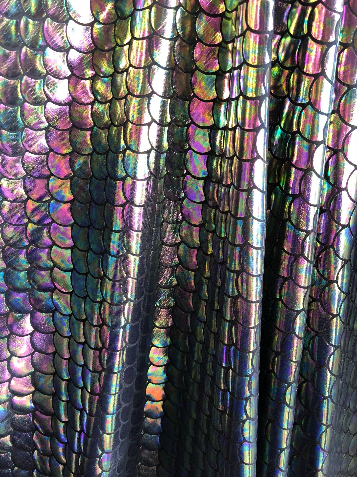 New iridescent pewter mermaid design on nylon spandex 4way Stretch 58/60" Sold bu the YD. ships worldwide from Los Angeles California USA