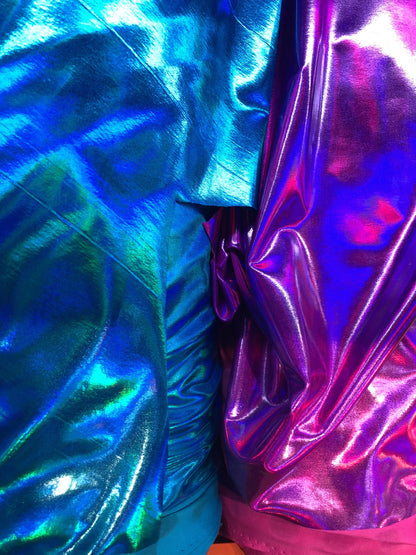 New iridescent all over foil turquoise and fuschia nylon spandex 4way stretch 58/60" Sold by the YD. Ships worldwide from Los Angeles CA USA