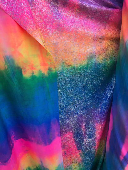 New rainbow print nylon spandex with hologram foil 4way Stretch 58/60" Sold by the YD. Ships worldwide from Los Angeles California USA.