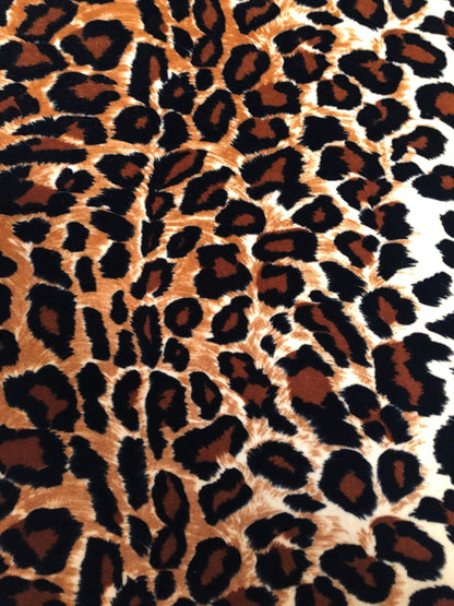 New leopard print Brown/Gold on heavy stretch velvet 4way stretch 58/60" Sold by the YD. Ships worldwide from Los Ángeles California USA.