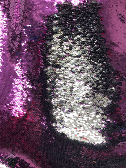 Flip up sequins eggplant/silver reversible sequins in spandex base 58/60" Sold by the YD. Ships worldwide from Los Angeles California USA.