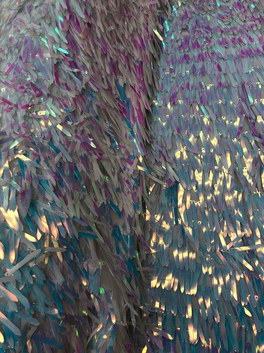 New iridescent white sequins sword design on stretch mesh base 2way stretch 58/60" Sold by the YD. Ships worldwide from Los Angeles CA USA.
