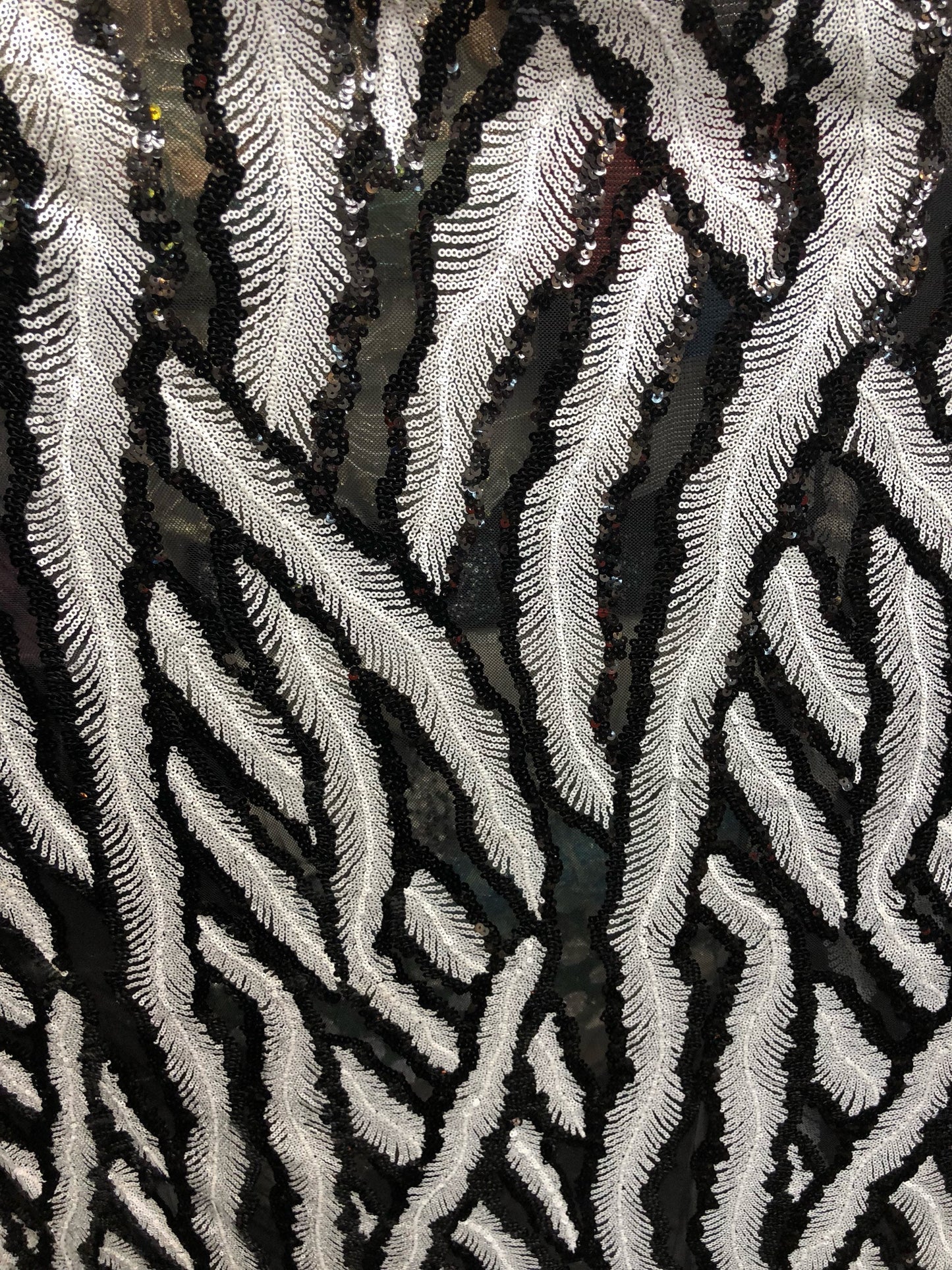 New sequins leaf design black/white 2way Stretch 58/60" Sold by the YD. Ships worldwide from Los Angeles California USA