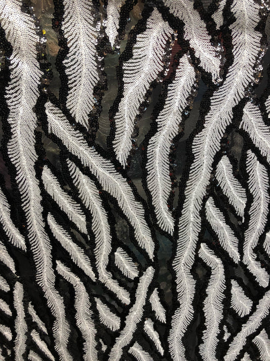 New sequins leaf design black/white 2way Stretch 58/60" Sold by the YD. Ships worldwide from Los Angeles California USA