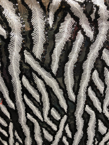 New sequins leaf design black/white 2way Stretch 58/60" Sold by the YD. Ships worldwide from Los Angeles California USA