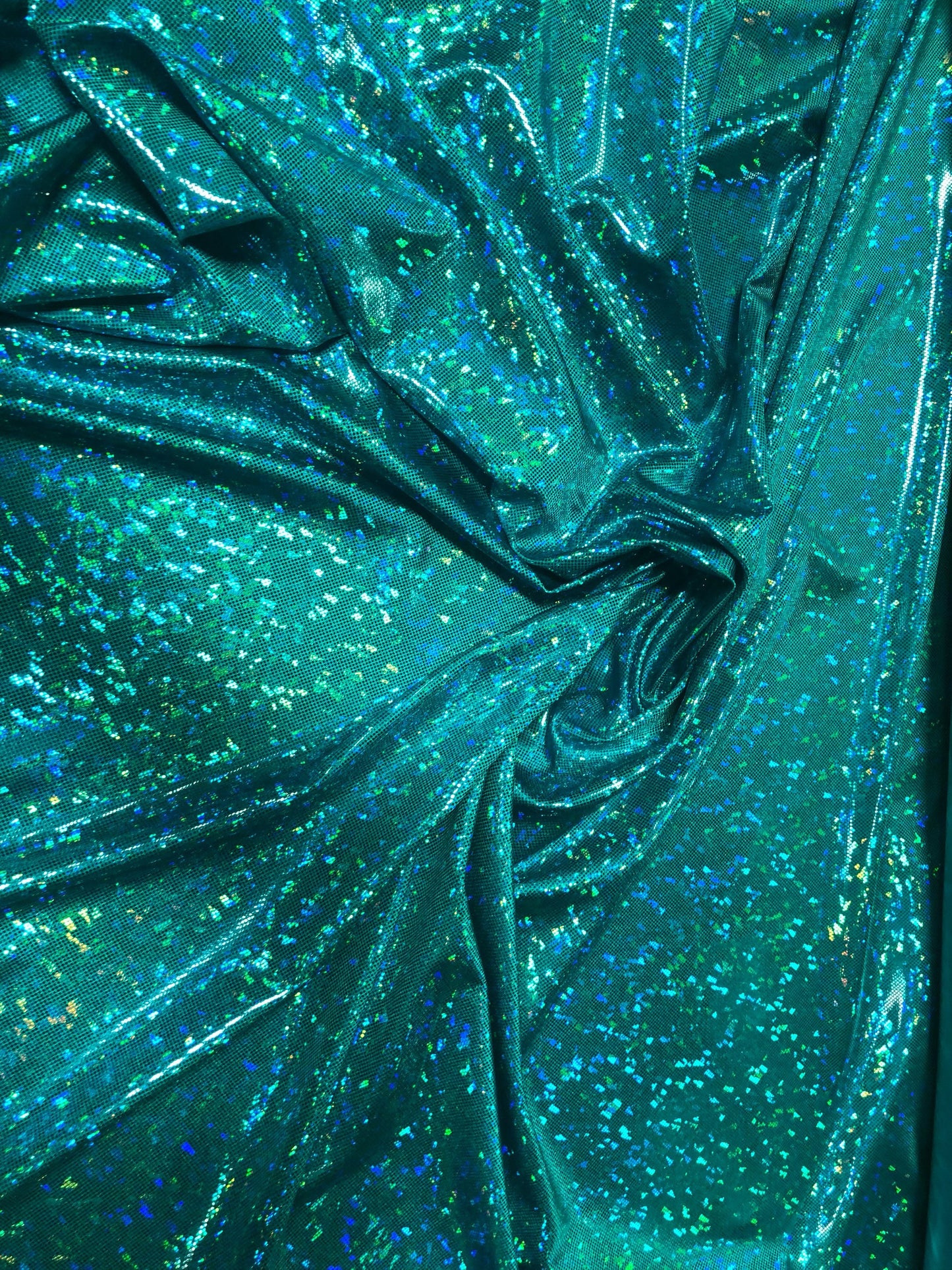 New nylon spandex broken glass metallic hologram 4way Stretch 58/60" Sold by the YD. Ships worldwide from Los Angeles California USA.