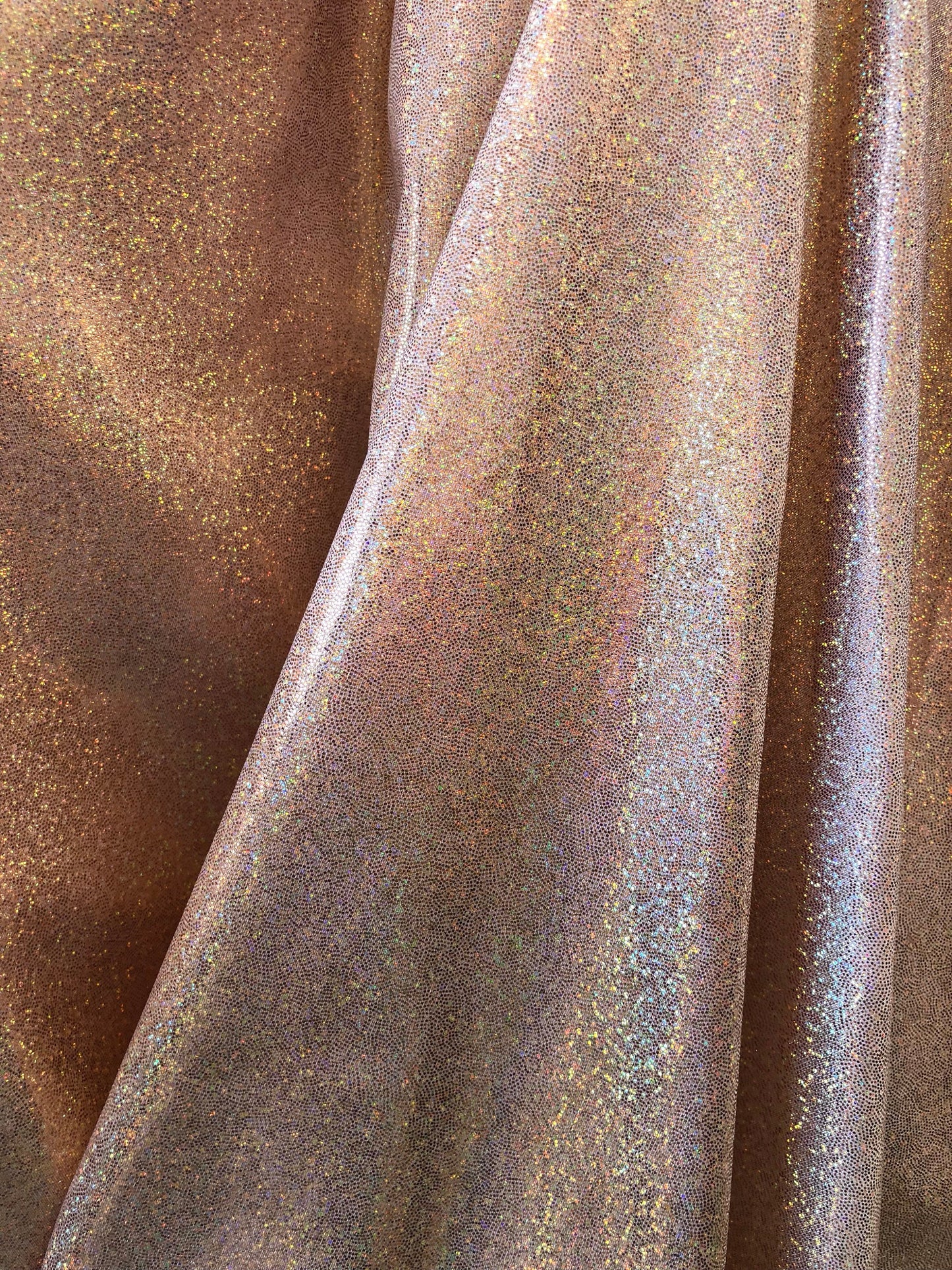 New foggy foil hologram metallic spandex blush color 4way Stretch 58/60" Sold by the YD. Ships worldwide from Los Angeles California USA.