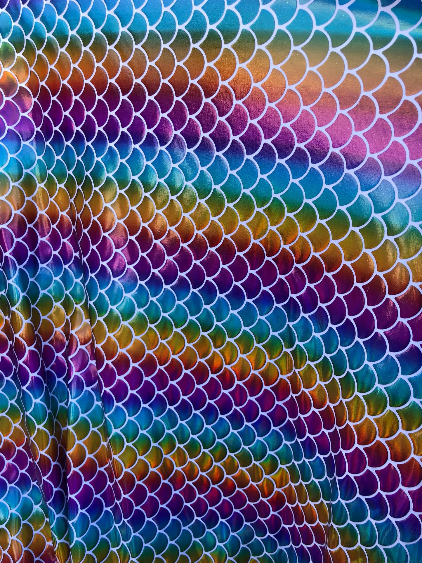 New rainbow mermaid fish scale foil on nylon spandex 4way Stretch 58/60" Sold by the YD. Ships worldwide from Los Angeles California USA