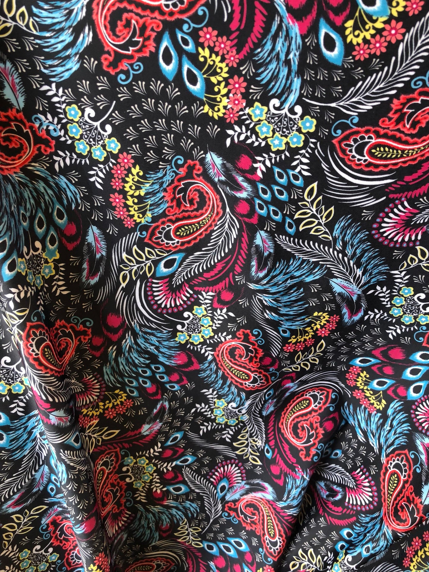 New nylon spandex paisley design print 4 way stretch 58/60" Sold by the YD. Ships worldwide from Los Angeles California USA