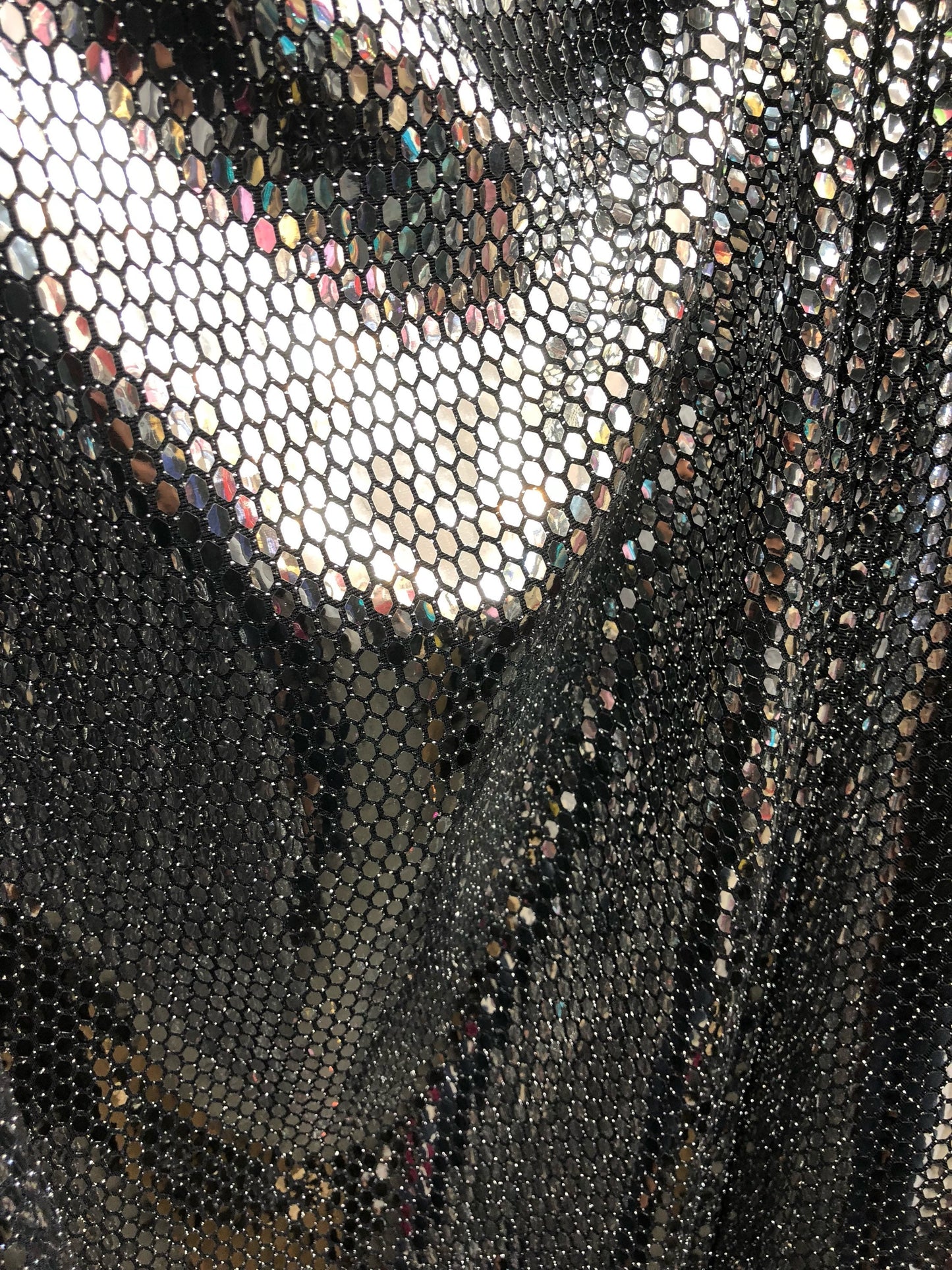 New silver sequins Honeycomb design on spandex base 2way Stretch 58/60" Sold by the YD. Ships worldwide from Los Angeles California USA