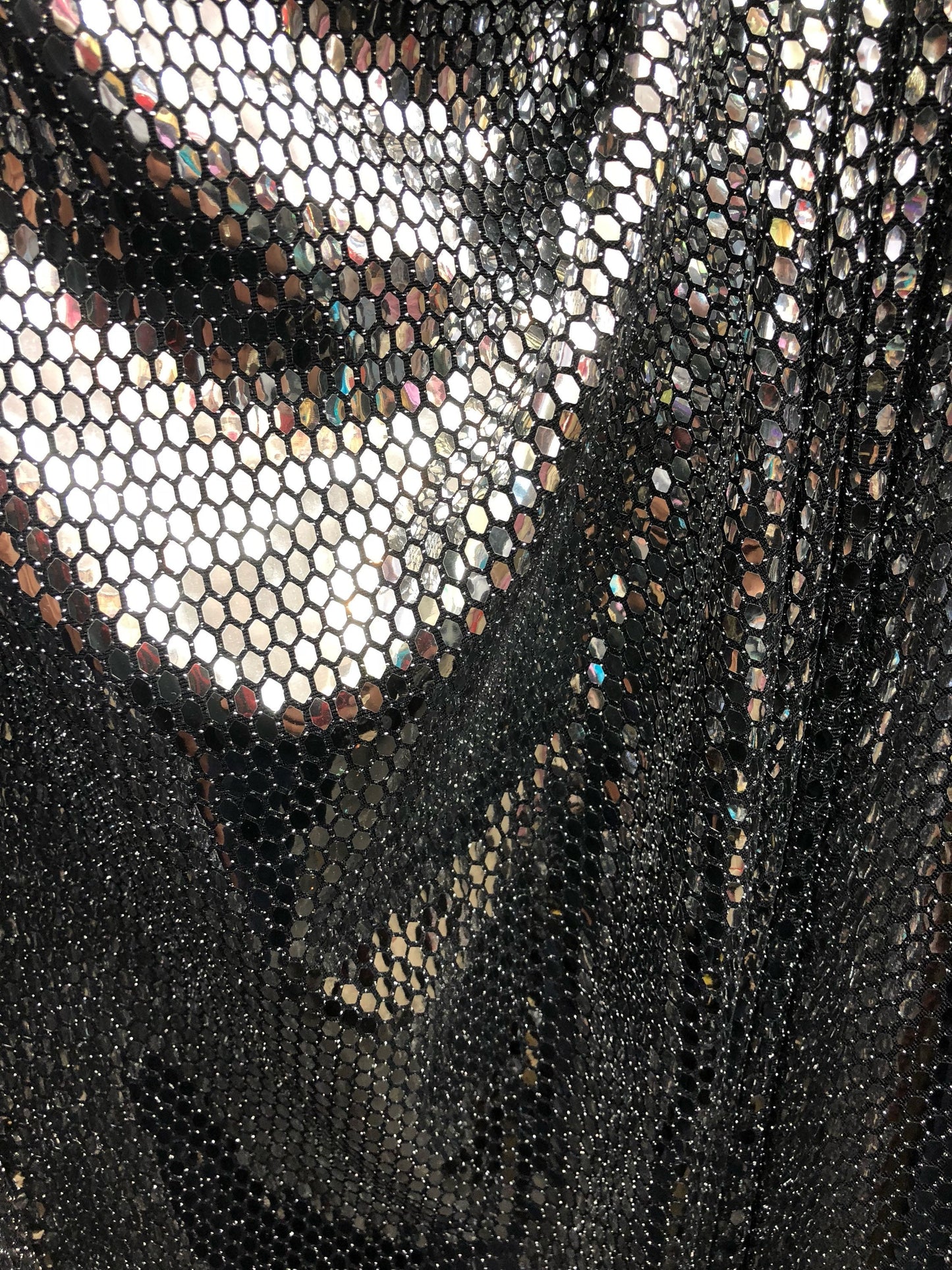 New silver sequins Honeycomb design on spandex base 2way Stretch 58/60" Sold by the YD. Ships worldwide from Los Angeles California USA