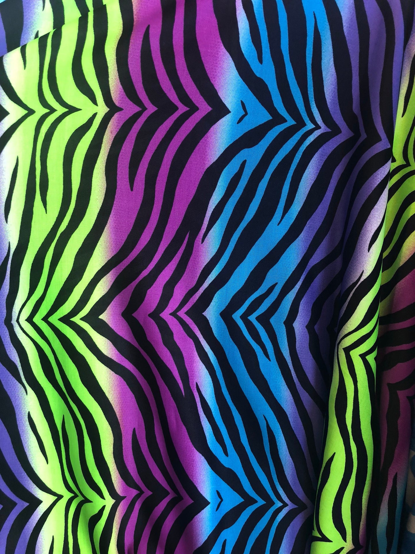 New spandex zebra design multicolor light weight poly spandex 4way Stretch 58/60" Sold by the YD. Ships worldwide