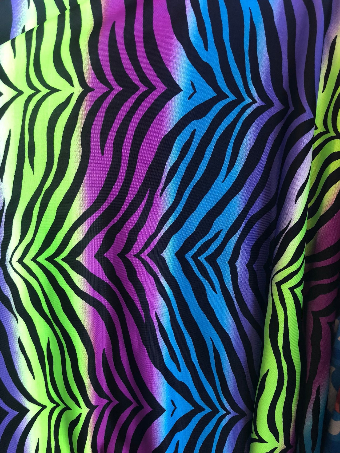 New spandex zebra design multicolor light weight poly spandex 4way Stretch 58/60" Sold by the YD. Ships worldwide