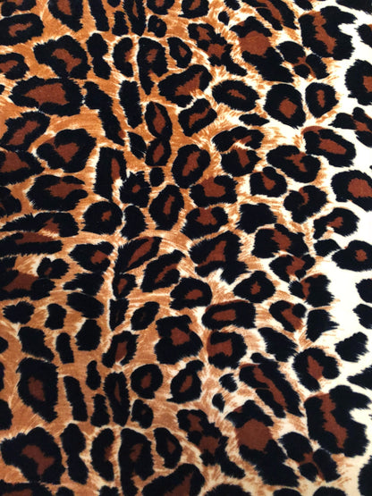 New leopard print Brown/Gold on heavy stretch velvet 4way stretch 58/60" Sold by the YD. Ships worldwide from Los Ángeles California USA.