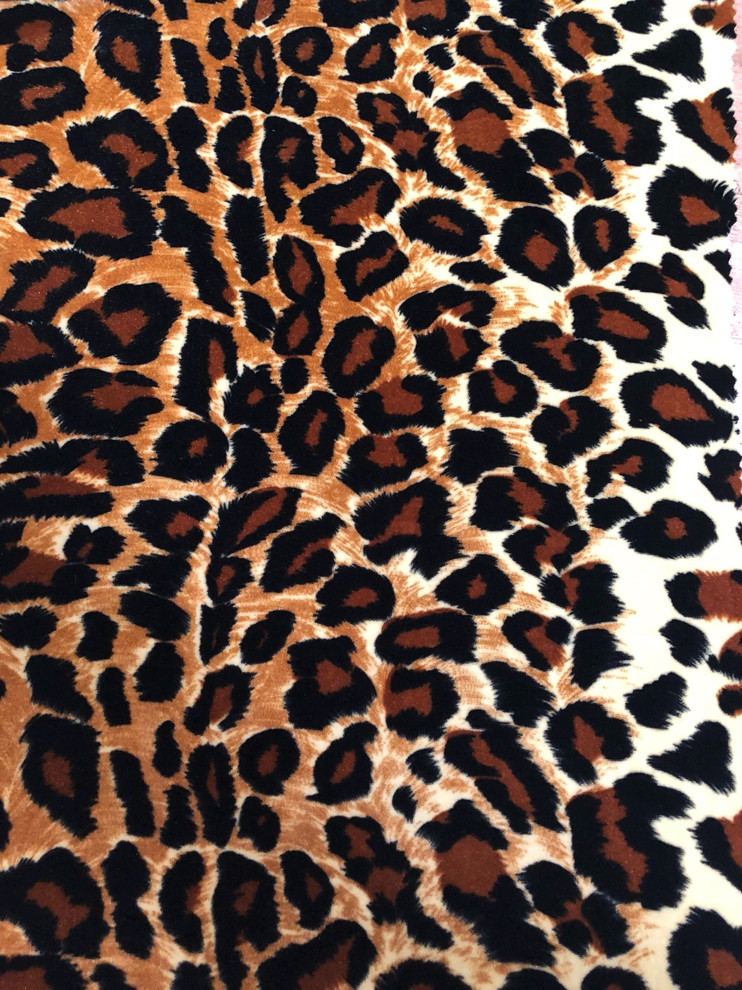 New leopard print Brown/Gold on heavy stretch velvet 4way stretch 58/60" Sold by the YD. Ships worldwide from Los Ángeles California USA.