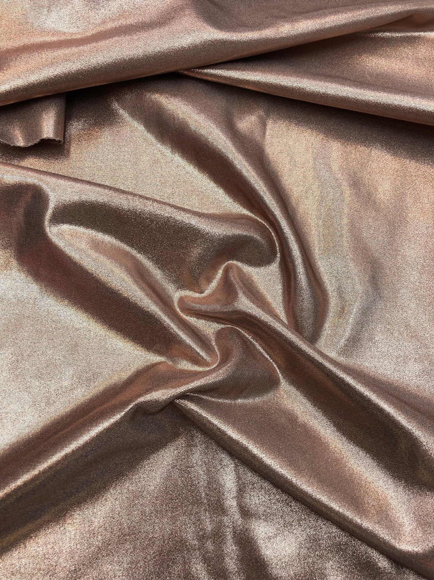 New all over foil nylon spandex rose gold color 4way Stretch 58/60" Sold by the YD. Ships Worldwide from Los Angeles California USA