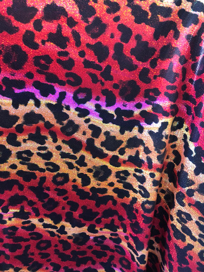 New leopard hologram foil design on nylon spandex 4way Stretch 58/60" Sold by the YD. Ships worldwide from Los Angeles California USA