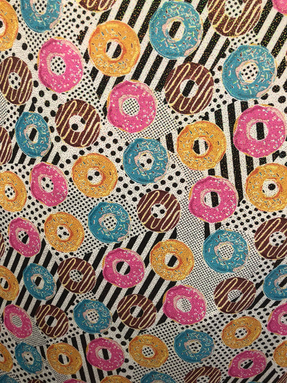 New nylon spandex print with foil all over yum yum donuts design 58/60" Sold by ghe YD. Ships worldwide from Los Angeles California USA.