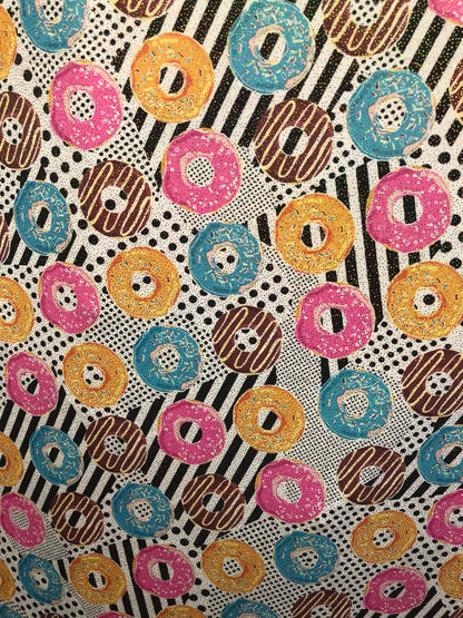 New nylon spandex print with foil all over yum yum donuts design 58/60" Sold by ghe YD. Ships worldwide from Los Angeles California USA.