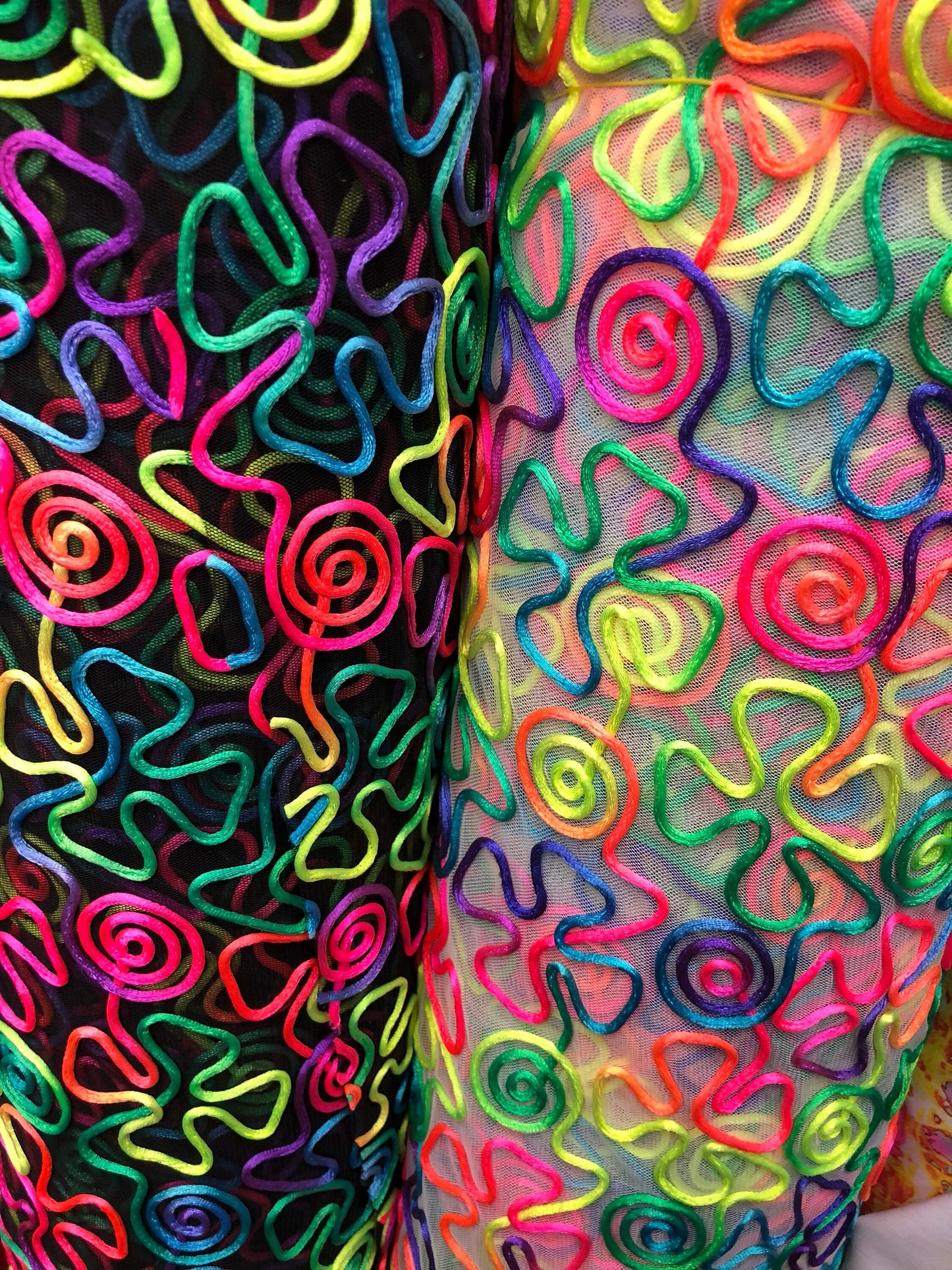 New stretch mesh swirl design rainbow color 2way stretch 55/57" Sold by the YD. Ships worldwide from Los Angeles California USA.