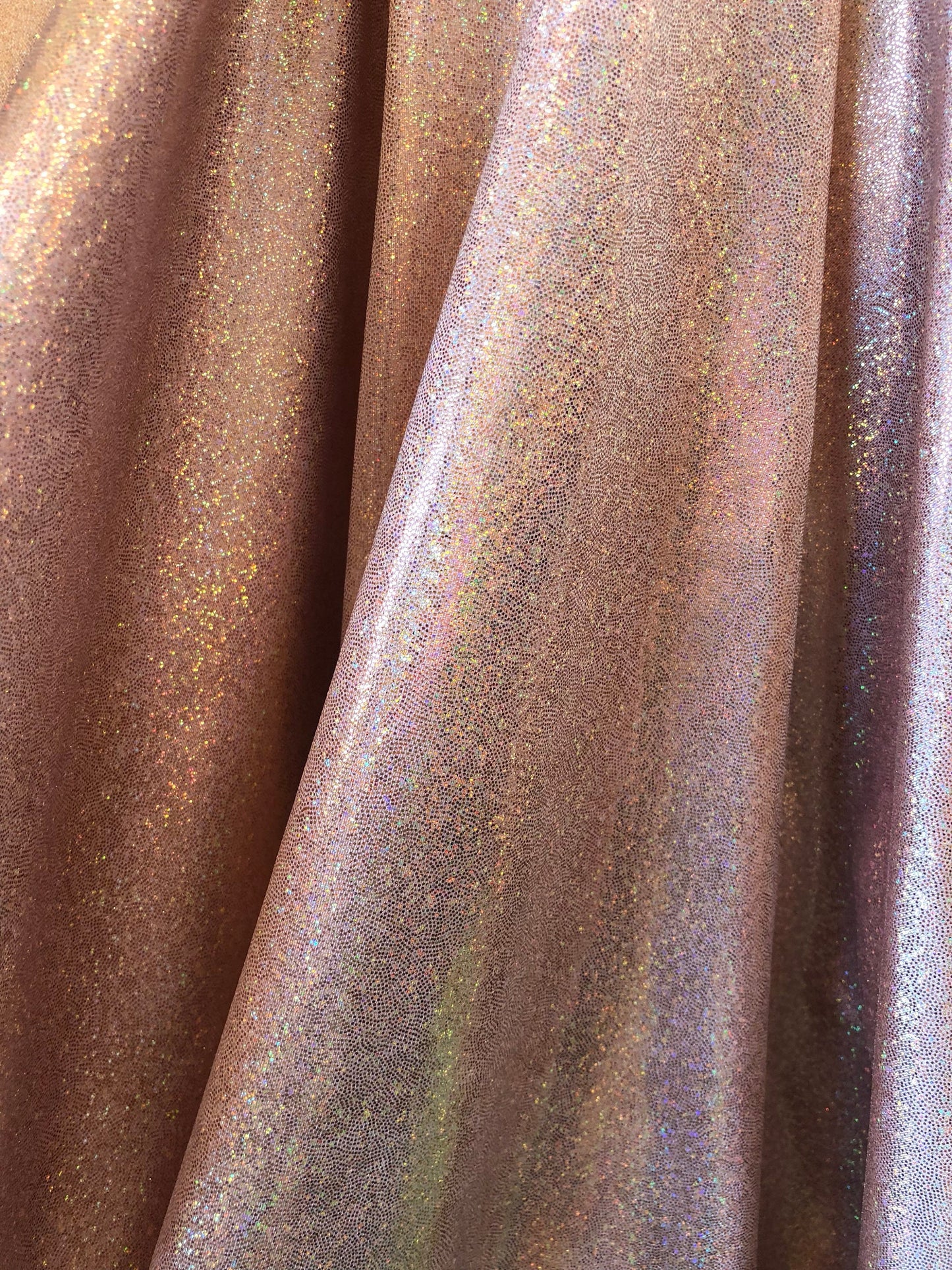 New foggy foil hologram metallic spandex blush color 4way Stretch 58/60" Sold by the YD. Ships worldwide from Los Angeles California USA.