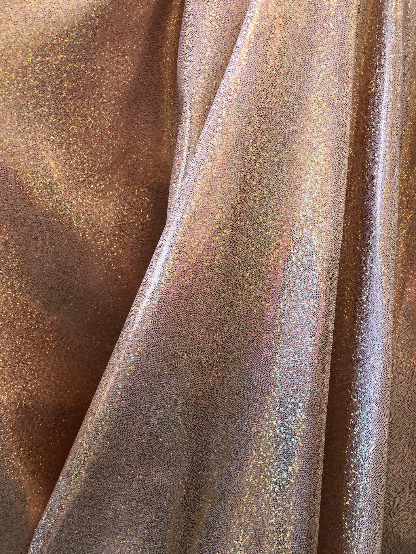 New foggy foil hologram metallic spandex blush color 4way Stretch 58/60" Sold by the YD. Ships worldwide from Los Angeles California USA.