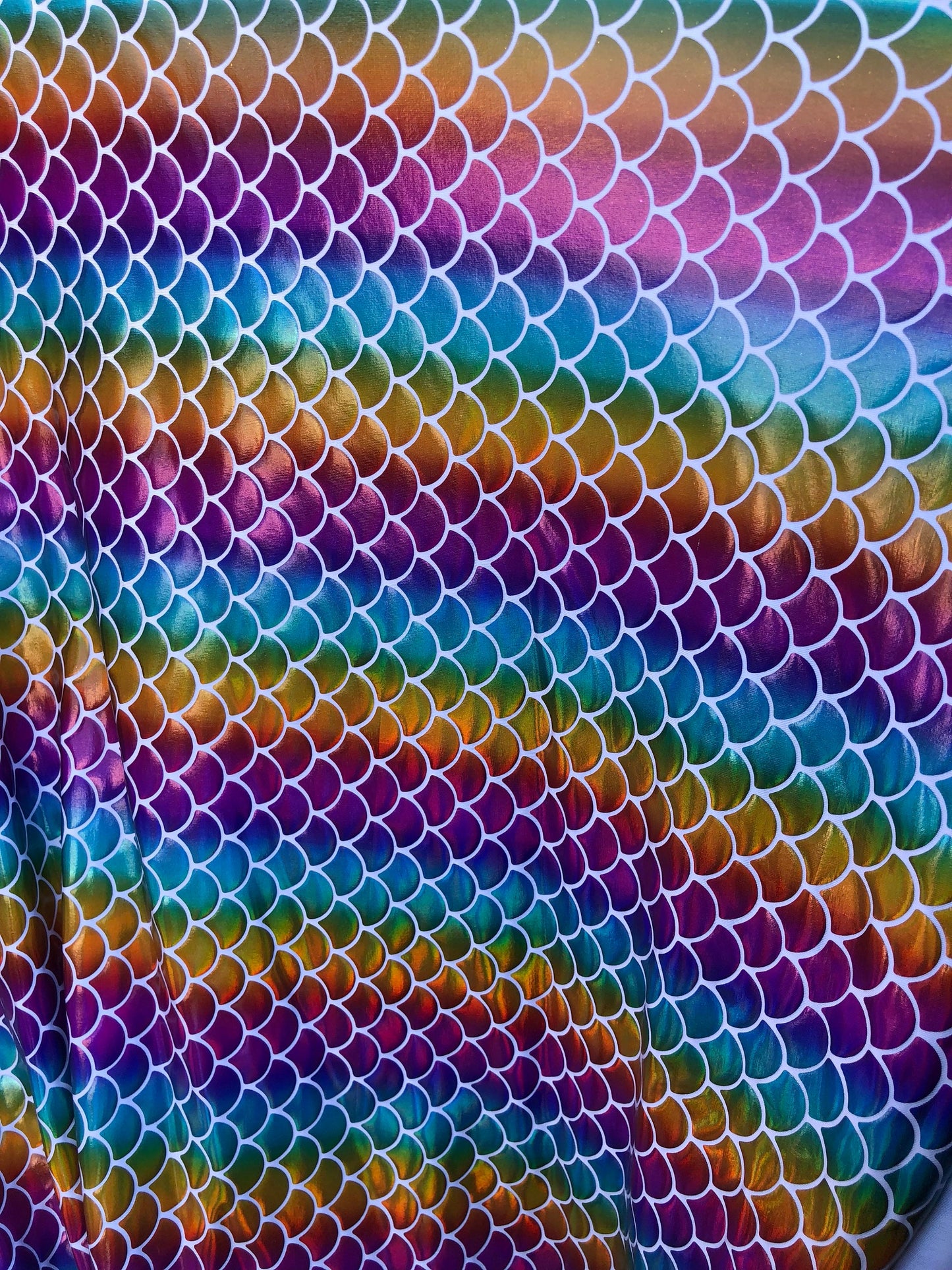 New rainbow mermaid fish scale foil on nylon spandex 4way Stretch 58/60" Sold by the YD. Ships worldwide from Los Angeles California USA