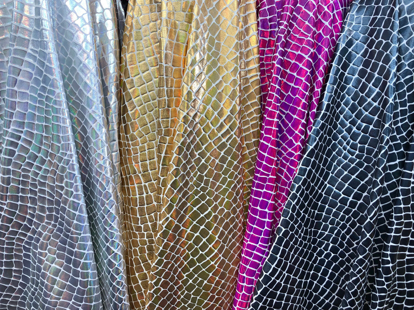 New metallic nylon spandex crocodile iridescent foil 4way Stretch 58/60" Sold by the YD. Ships worldwide from Los Angeles California USA