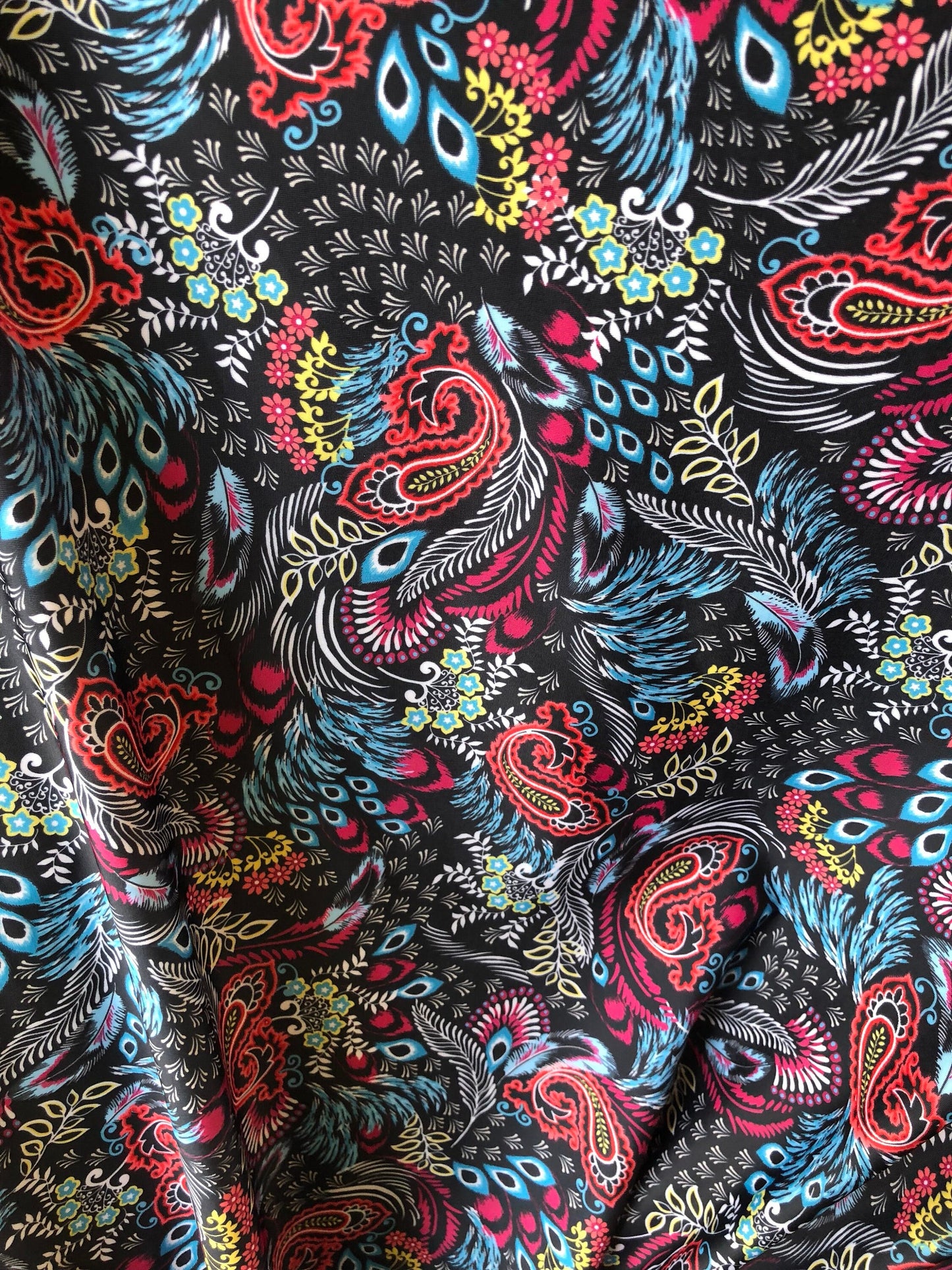 New nylon spandex paisley design print 4 way stretch 58/60" Sold by the YD. Ships worldwide from Los Angeles California USA