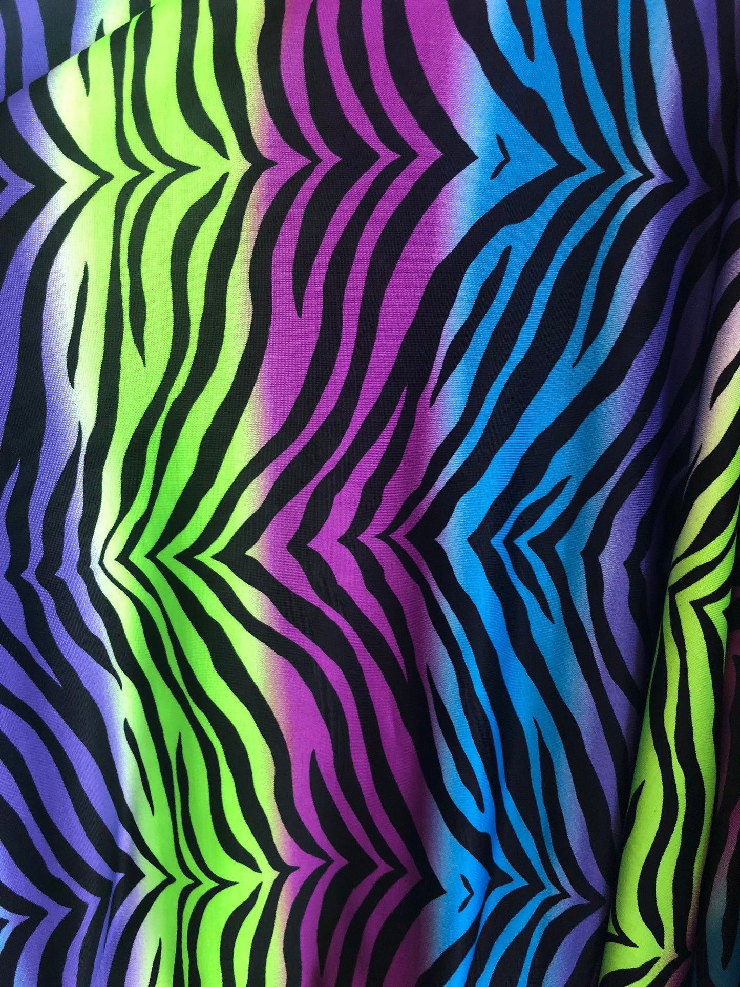 New spandex zebra design multicolor light weight poly spandex 4way Stretch 58/60" Sold by the YD. Ships worldwide