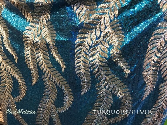 Long leaf glitz sequins two tone  on mesh base 58/60" Sold by the yd Ships worldwide from Los Angeles CA USA