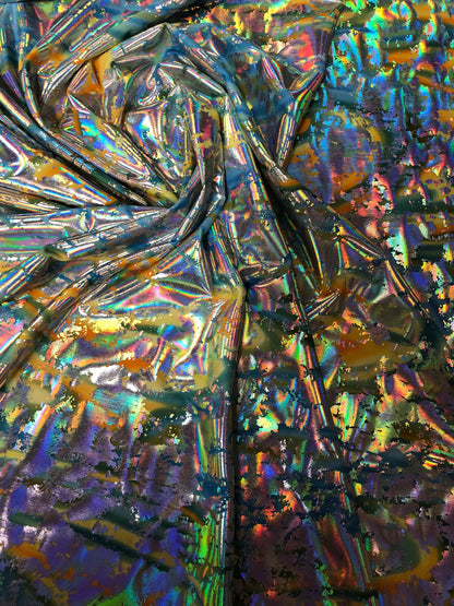 New metallic nylon spandex with lava print foil tie dye base 4way stretch 58/60" Sold by the YD. Ships worldwide from Los Angeles California