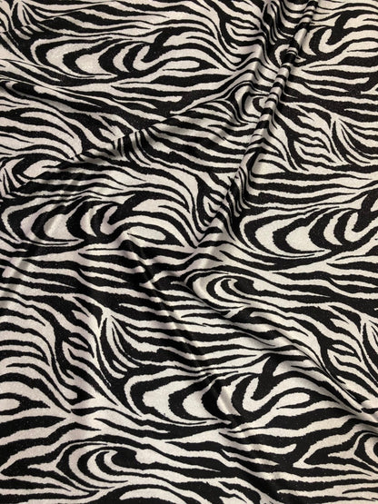 Zebra design  with silver glitter on heavy stretch velvet 4way 58/60" Sold by the YD. Ships worldwide from Los Angeles California USA.