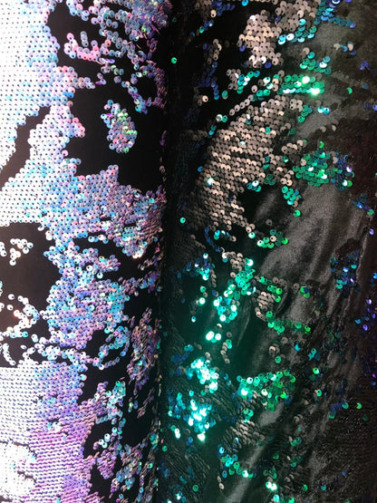 New Iridescent patch sequins on heavy stretch velvet 4way 2tone sequins 58/60" Sold by the YD. Ships worldwide from Los Angeles California.