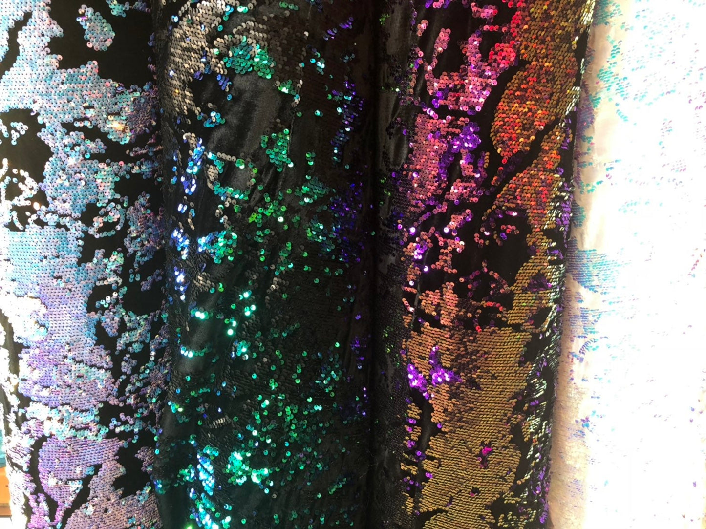 New Iridescent patch sequins on heavy stretch velvet 4way 2tone sequins 58/60" Sold by the YD. Ships worldwide from Los Angeles California.